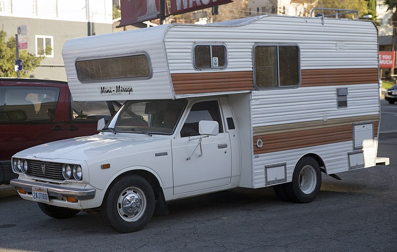 C:\Users\USER\Desktop\Files\writing job\The Vine Productions\New Client Job\April 2022\93842-0540FR\800px-1978_Toyota_pickup_with_Mini_Mirage_camper_(front_left).jpg